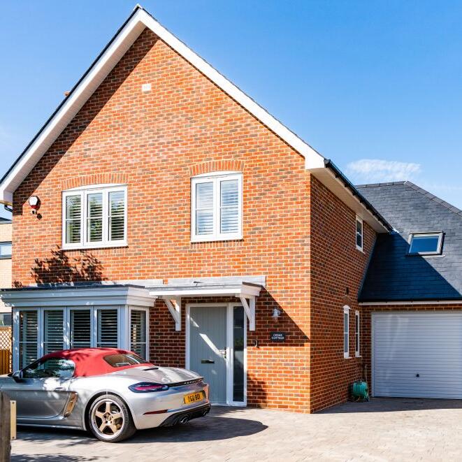 Two detached houses in Milford on Sea